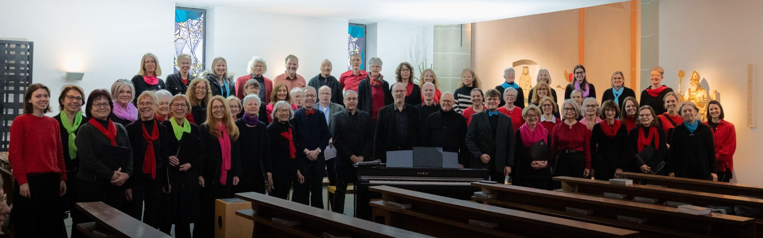 Bild von Sängerinnen und Sängern aus drei Chören von katholisch in Hürth