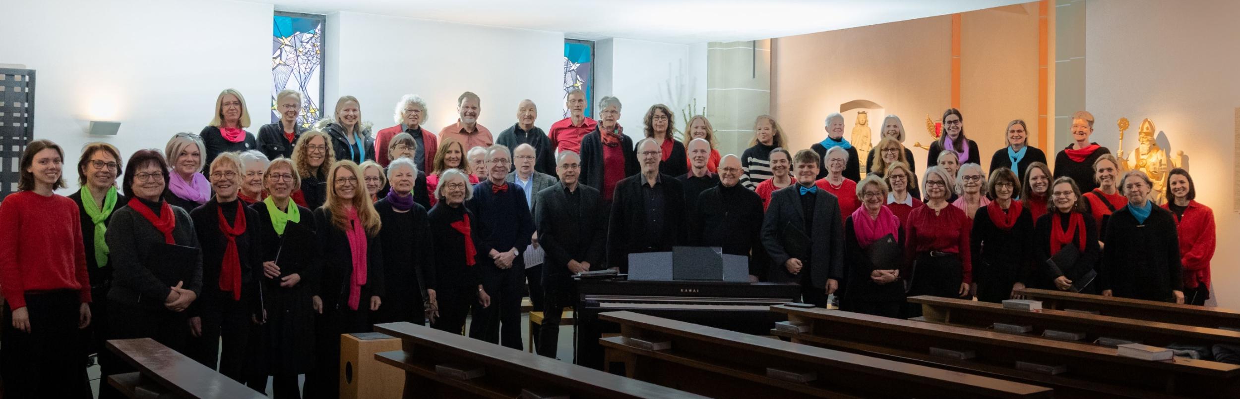Bild von Sängerinnen und Sängern aus drei Chören von katholisch in Hürth